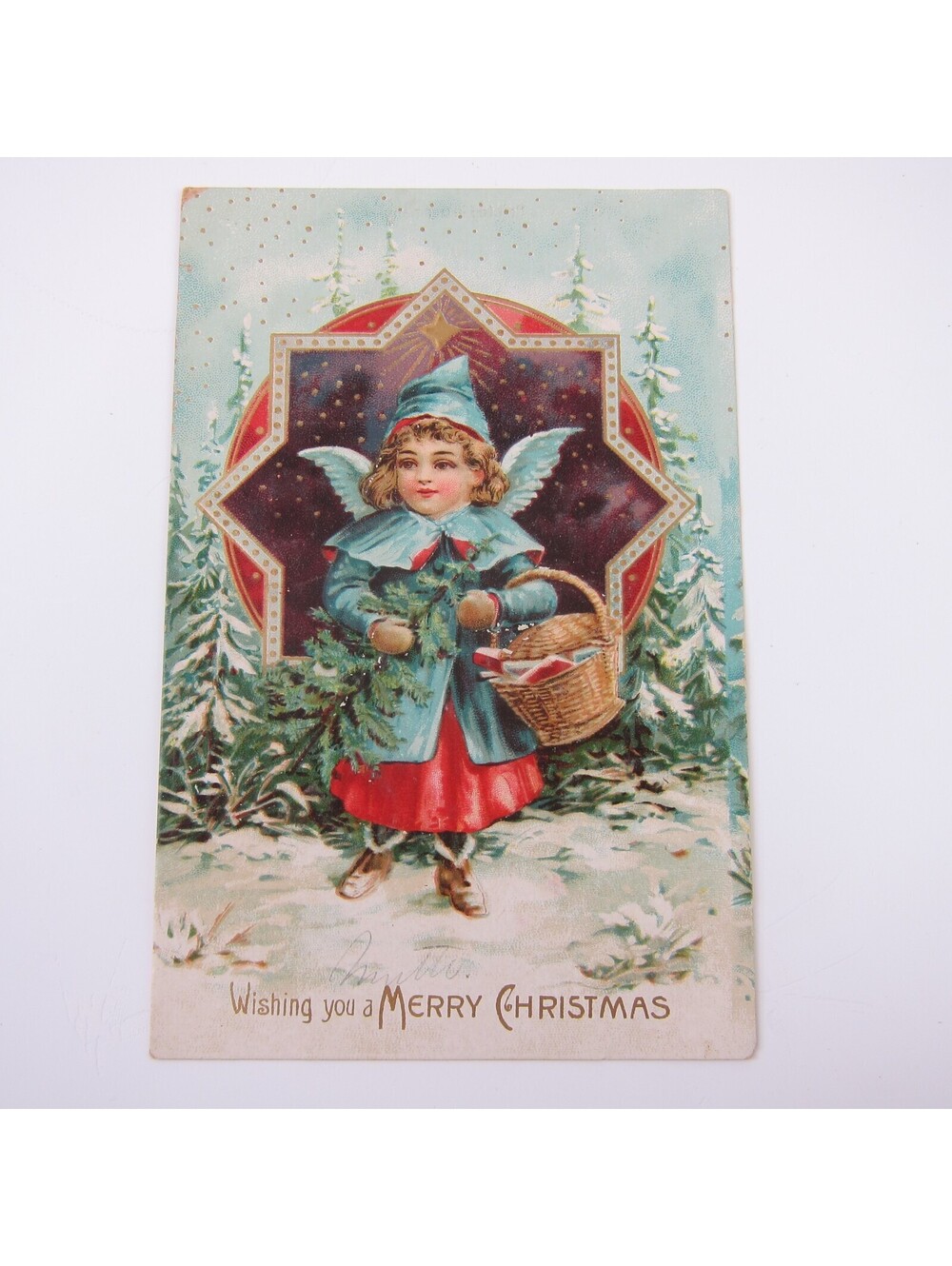 Christmas Postcard Girl Carries Basket & Tree in Snow Gold Embossed Antique